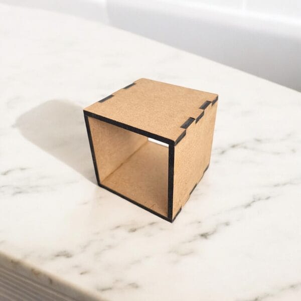 Enhance your dollhouse with this modern miniature display cabinet, perfect for 1/6 and 1/12 scale designs. This tiny cube box is a versatile accessory for DIY living room decor, doll furniture, or toy house displays.