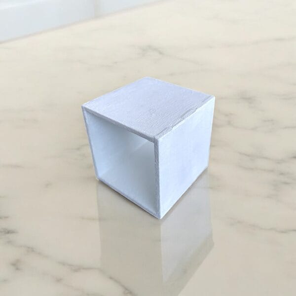 Enhance your dollhouse with this modern miniature display cabinet, perfect for 1/6 and 1/12 scale designs. This tiny cube box is a versatile accessory for DIY living room decor, doll furniture, or toy house displays.